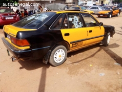 TAXI TOYOTA CARINA 2